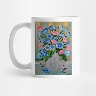 vibrant pink and blue bouquet of flowers in a silver and gold vase Mug